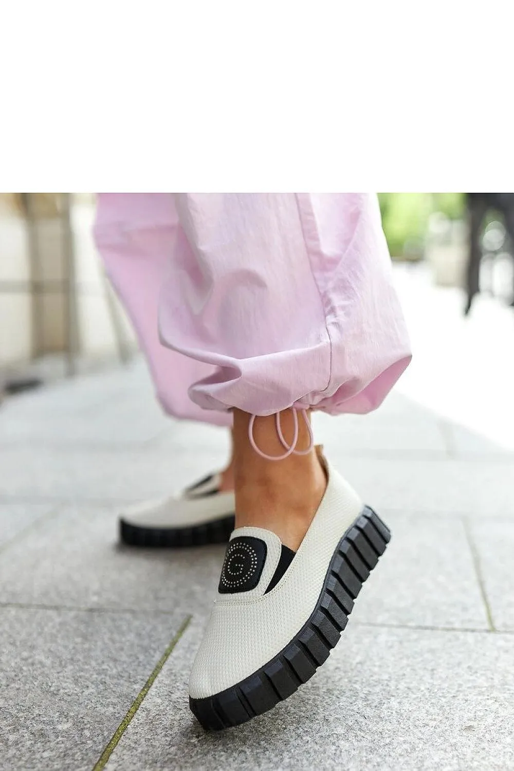 Black loafers on a massive sole