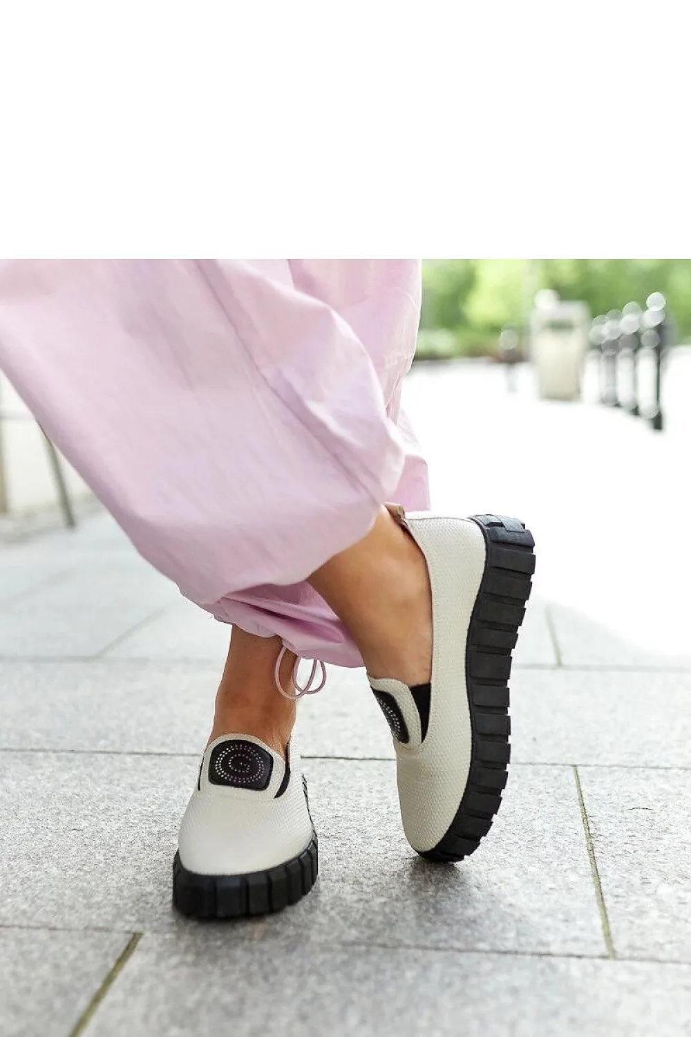 Black loafers on a massive sole